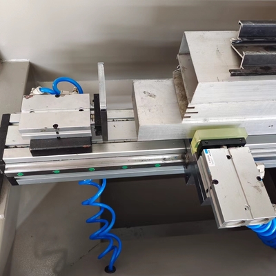 Máquina de perforación y fresado CNC de doble cabeza de 1500 mm Máquina de rotación de copias Máquina de fabricación de puertas de ventanas CNC
